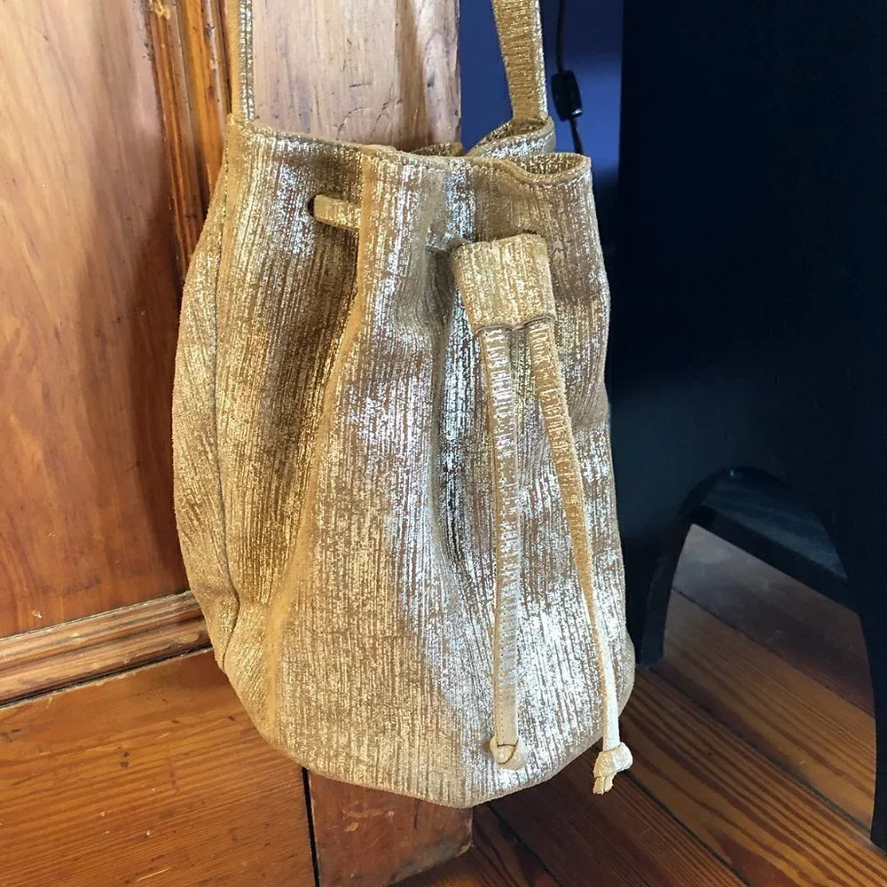 Marie Turnor Neutral Metallic Textured Drawstring Bucket Bag